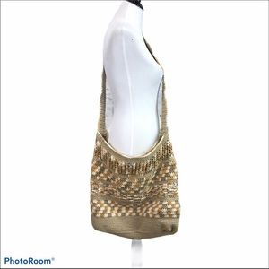 Large tan and cream crocheted crossbody bag with zipper top